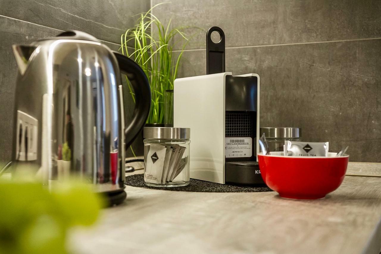 Grey Suites Печ Екстериор снимка